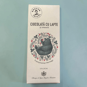 Răzvan Idicel milk chocolate bar with raspberry, featuring a bear illustration on white packaging.